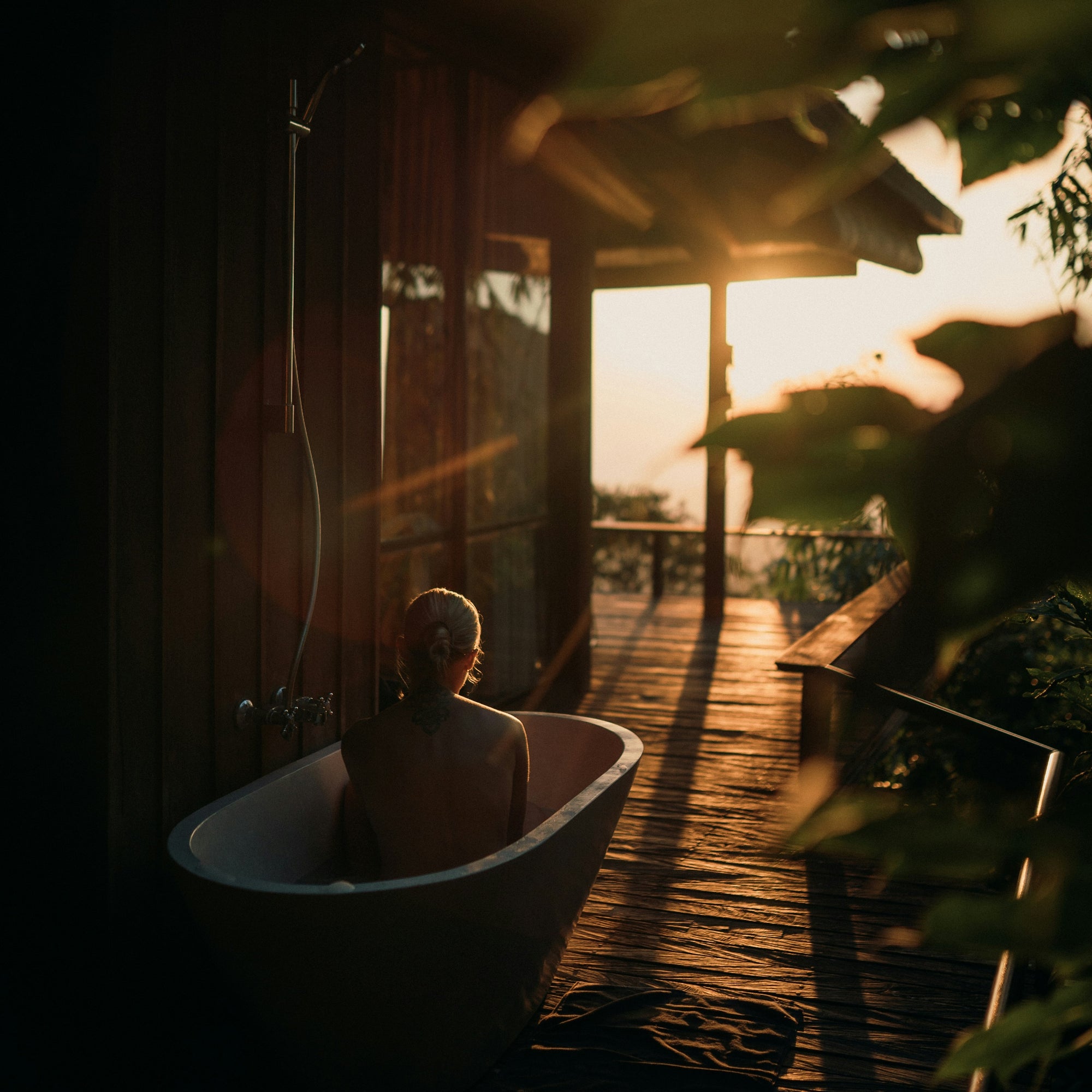 A scene of a luxury outdoor bath in NZ. Evoking feelings of treating yourself with a natural botanical handmade soap bar 